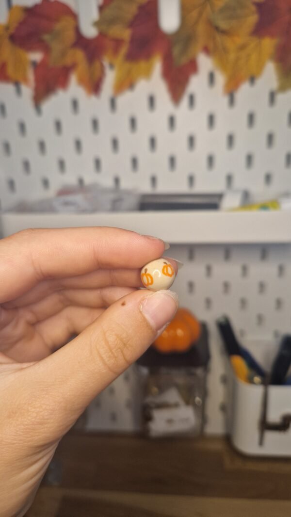 Collier de perles porte médaille